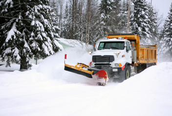 image of snow plow in operation