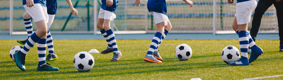 image of kids playing soccer